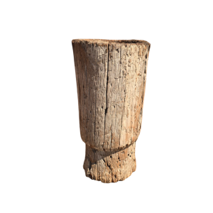 Hand carved maize grinder